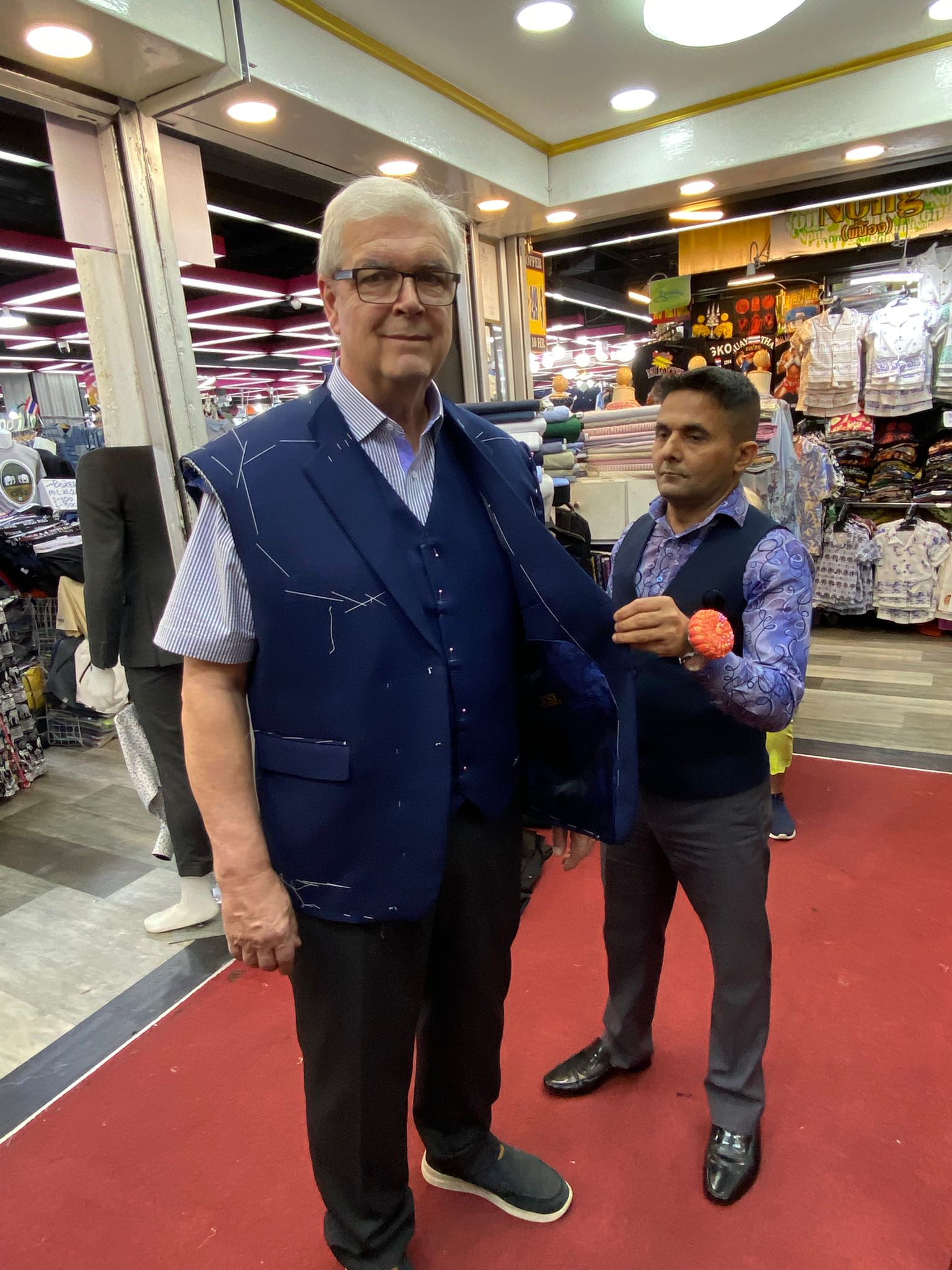 Happy client in custom tailored suit at King Fashion Uni Bangkok